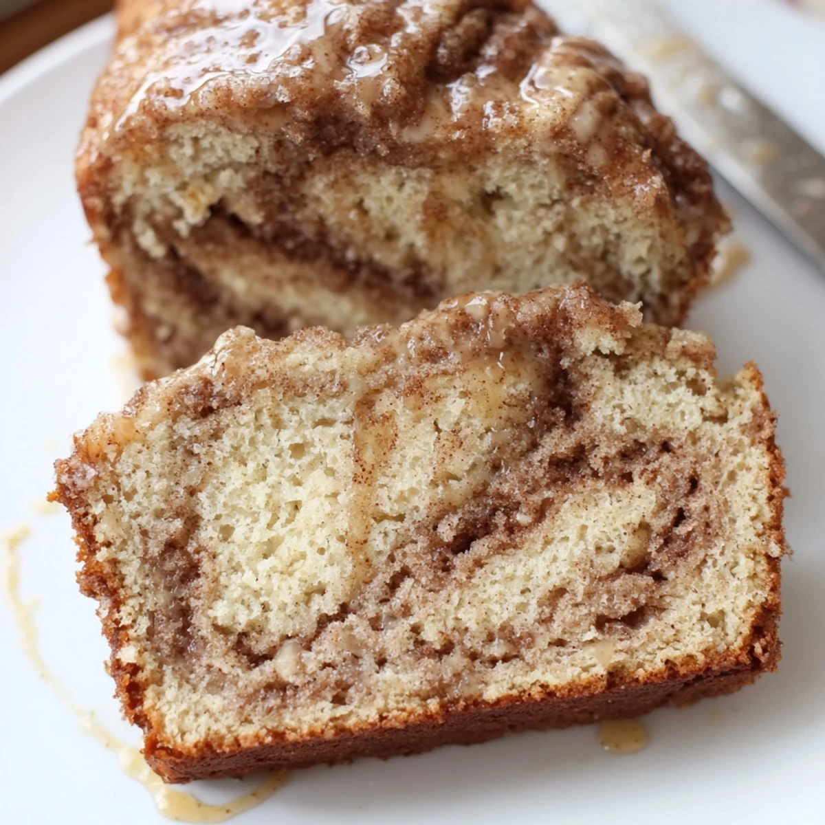 Freshly baked maple ginger cinnamon sugar pancake muffin loaf with a golden crust.  