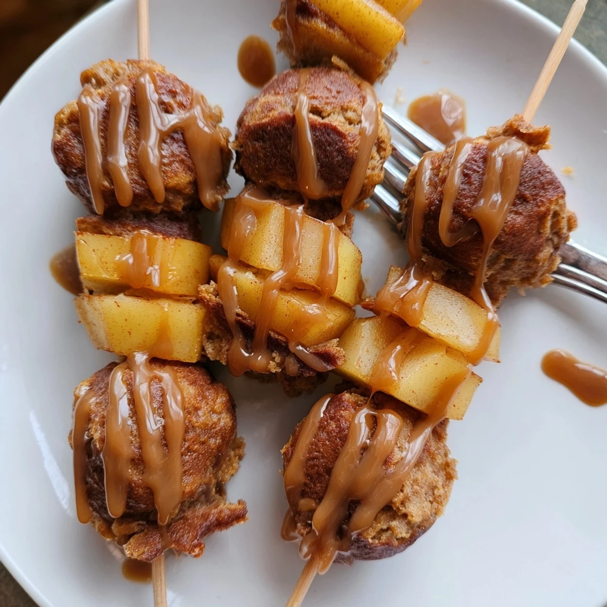 Autumn-inspired skewers featuring spiced pumpkin bites, chai muffins, and caramelized apples.