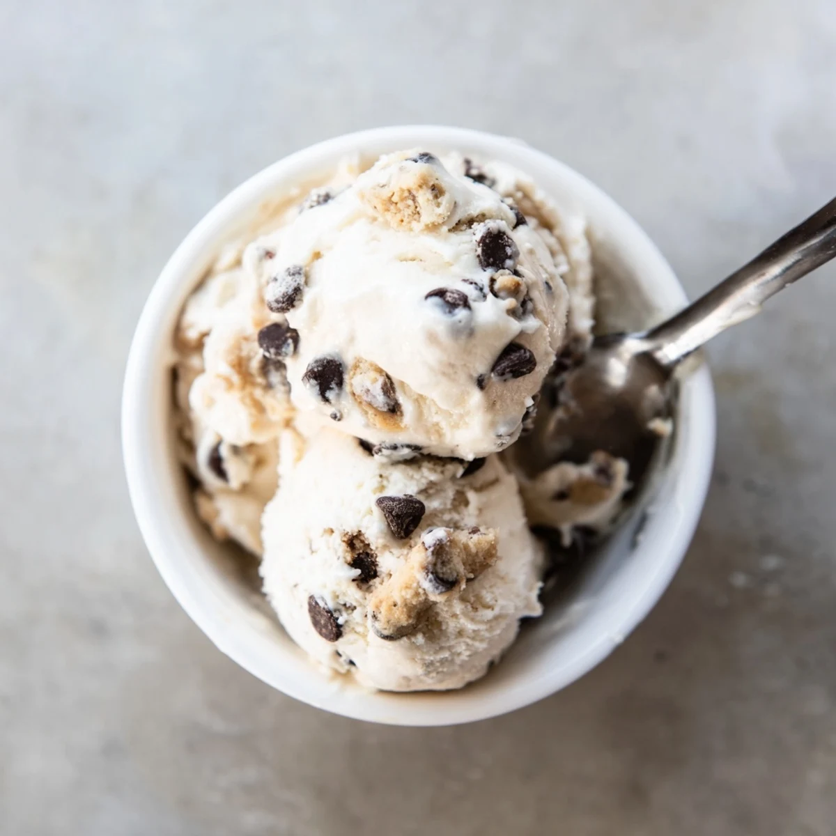 Indulge in tasty cottage cheese ice cream mixed with chocolate chip cookie dough.  