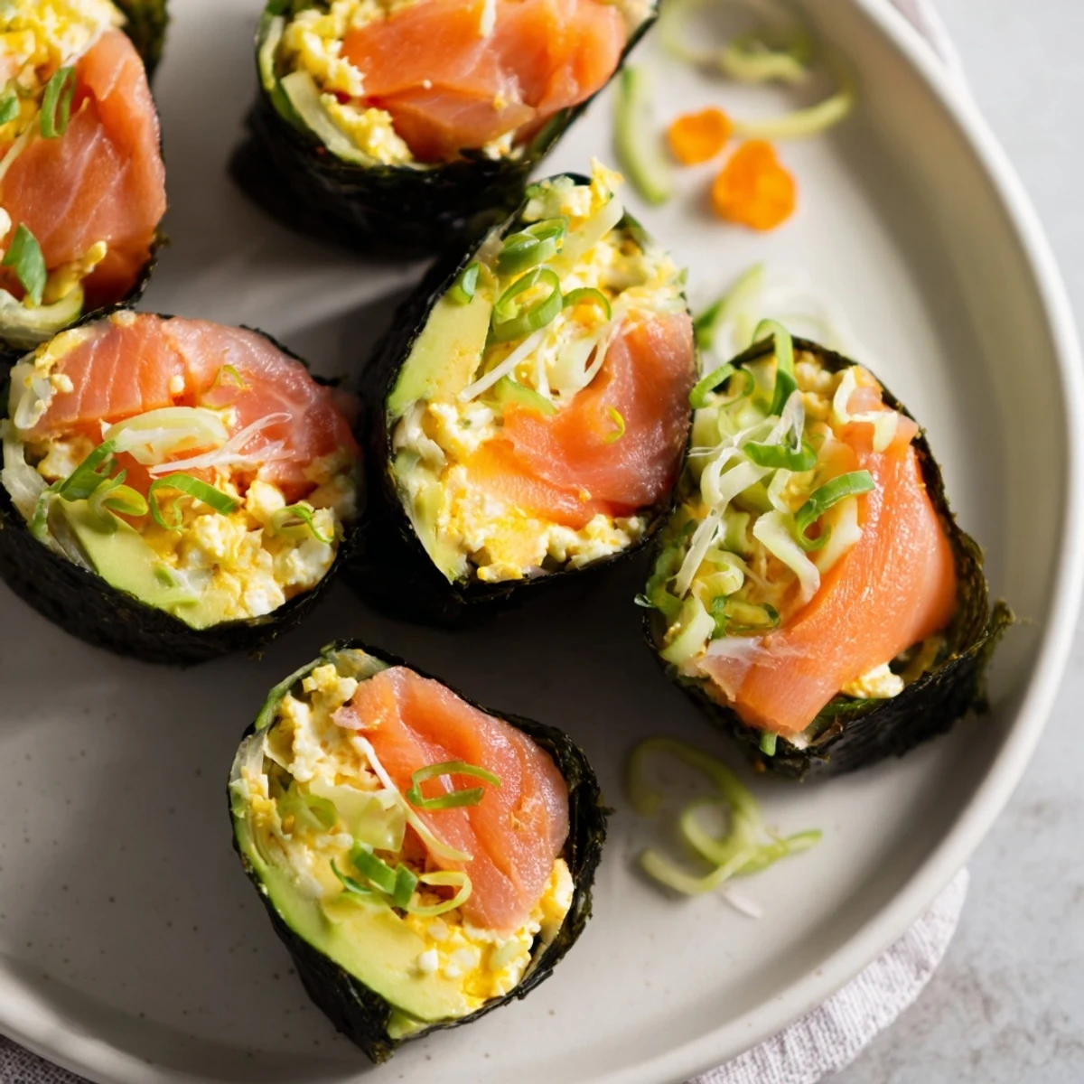 Vibrant High-Protein Sushi Wrap Smoked Salmon Holiday Roll, showcasing layers of fresh ingredients wrapped tightly.