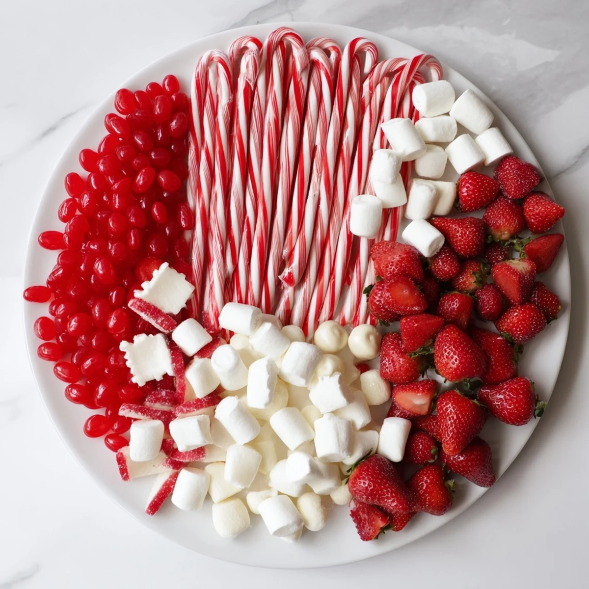 Sweet Board display: A vibrant dessert board with red and white treats, ready to serve and enjoy.