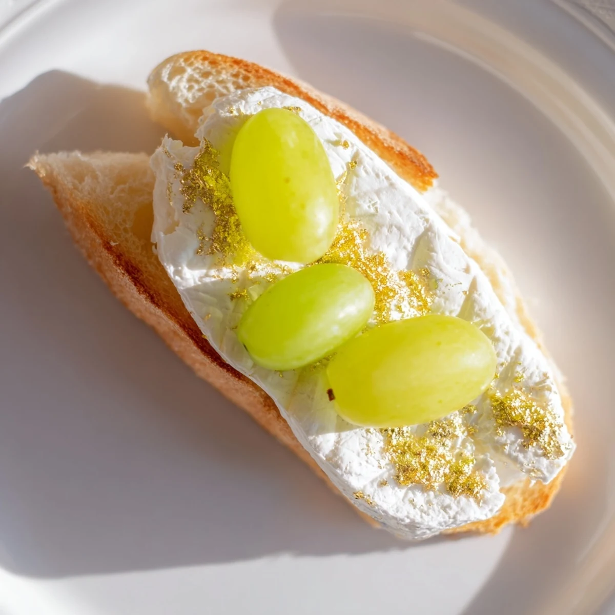 Imagine elegant, bite-sized Sparkling Champagne Toasts; the glistening grapes and cheeses are utterly delicious.