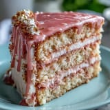 Decadent Bridal Shower Rosé Velvet cake, frosted and dripping gold.