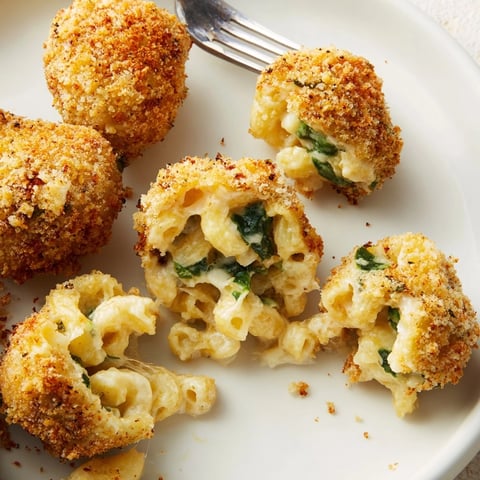 Golden fried Mac and Cheese Bacon Spinach Poppers, cheesy, savory, and irresistibly crunchy.