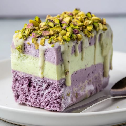 Creamy ube & pistachio ice cream bars topped with pistachios for crunch.  