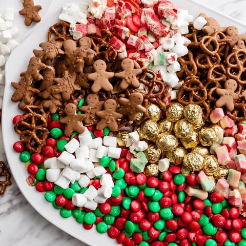 A colorful Santa's Sack Candy Avalanche with a variety of sweet and salty holiday treats.