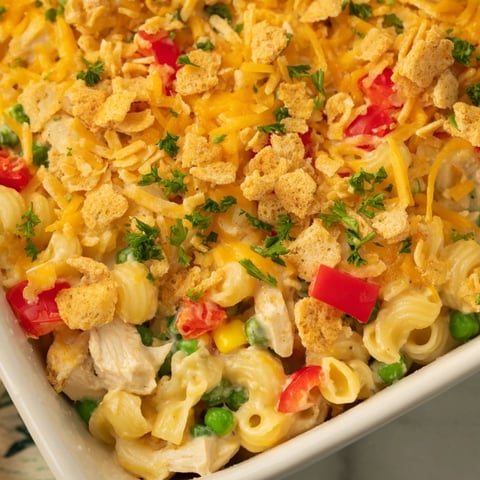 Golden-brown Chicken Macaroni Southern Style, bubbling hot from the oven, offering a comforting aroma.