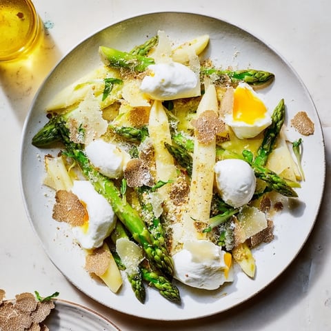 Tender white asparagus and cheese compose this elegant Silver Birch, drizzled with truffle and dressing.