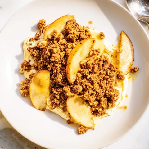 Warm Ricotta Apple Granola Crisp: sweet cinnamon apples topped with creamy ricotta and crunchy granola.