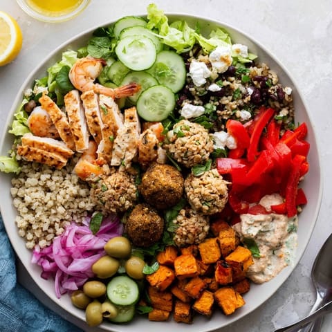 Guests assembling fresh ingredients in customizable bowls for the Interactive Plated Meals.  