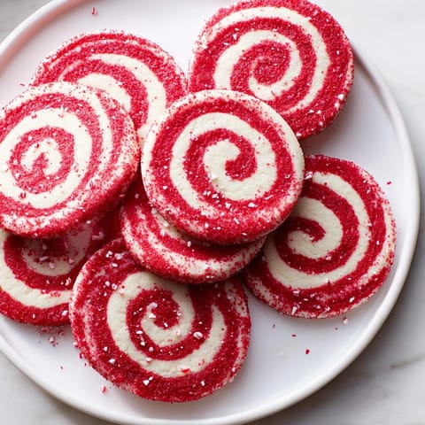Freshly baked Candy Cane Swirl Cookie Platter shows delightful, swirly cookies perfect for sharing this holiday season.