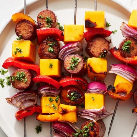 Golden Savory Skewers: Chimney Stack Sausage and Cheese appetizers, bursting with juicy sausage and peppers.