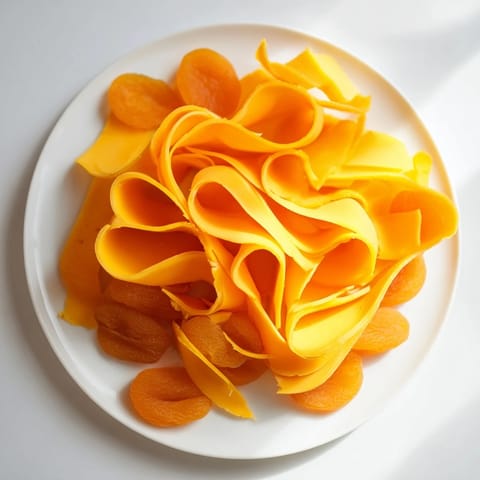 Arranged beautifully, this Copper Coil recipe shows layers of cheese and apricot ready to serve.