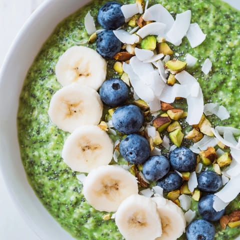 Visualize a cool jar of Matcha Overnight Oats, looking vibrant and tempting for you to enjoy.